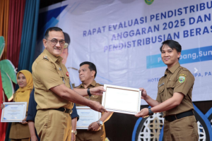 ASN Sumsel Dipastikan Tetap Terima Beras 2026! Sekda Teken SPK Bersama Bulog